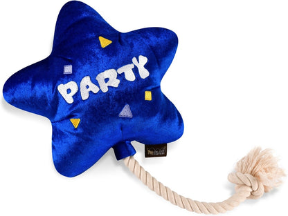 Perro jugando con la colección Party Time P.L.A.Y.